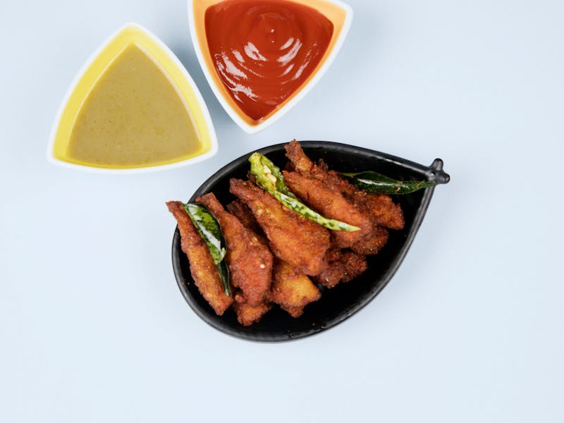 Coal fired chicken wings with buffalo sauce